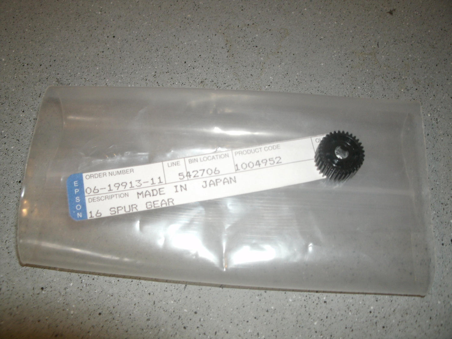 Epson 1004952. New. 16 Spur Gear.