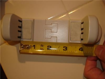 Computer Stand. Beige. 3 7/8" Wide where the computer sits.