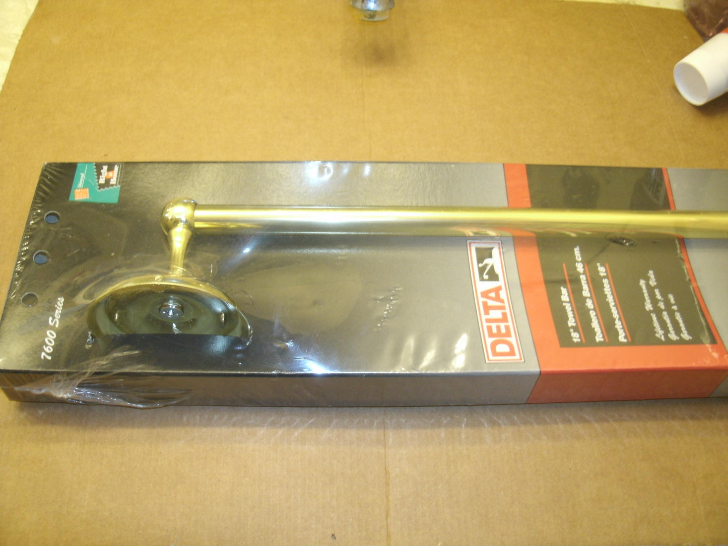 Delta 76020PB, 7600 Series 18" Towel Bar. Brass Finish. New.