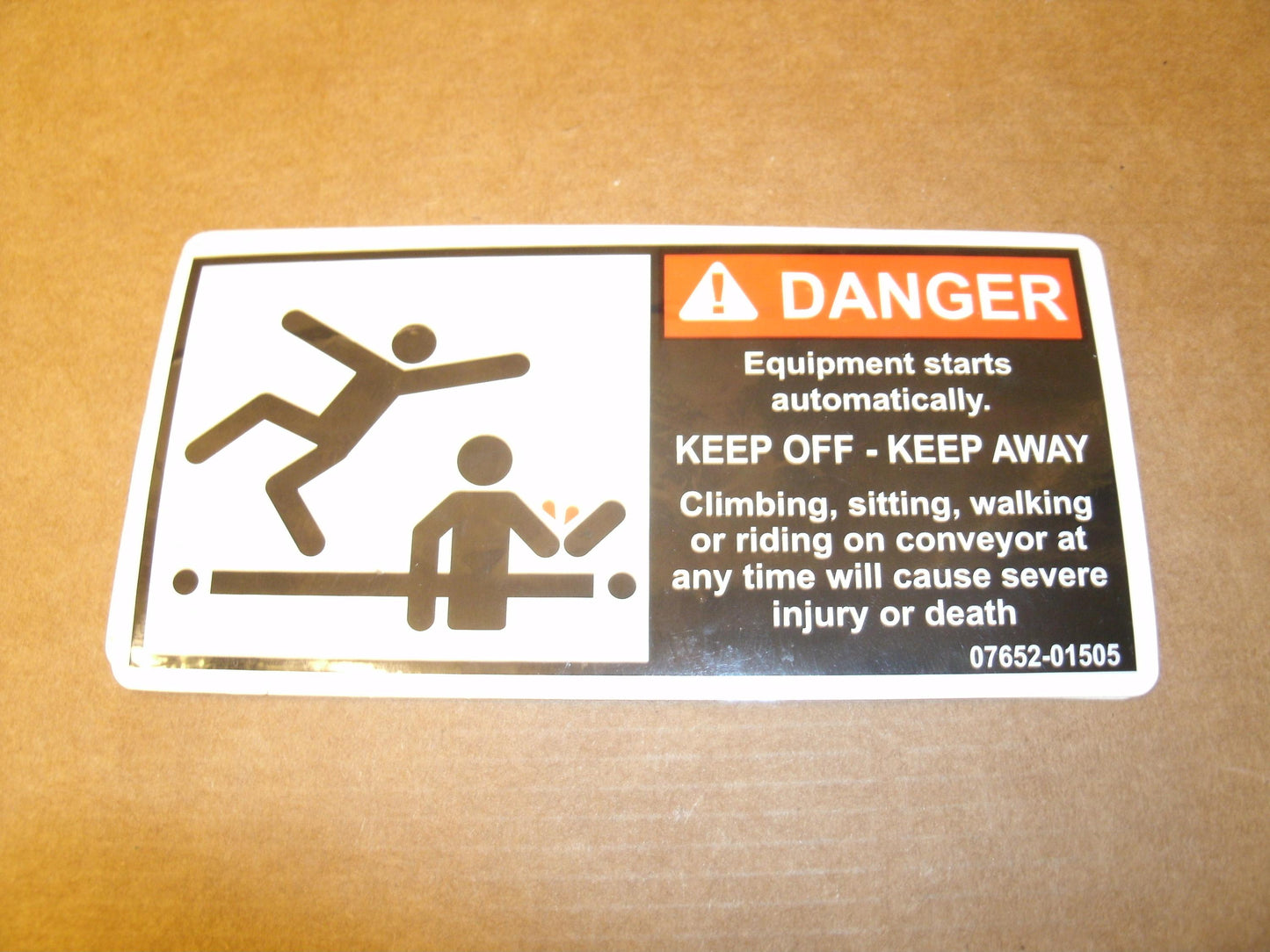 Danger Equipment Starts Automatically... Keep Off... Sign.