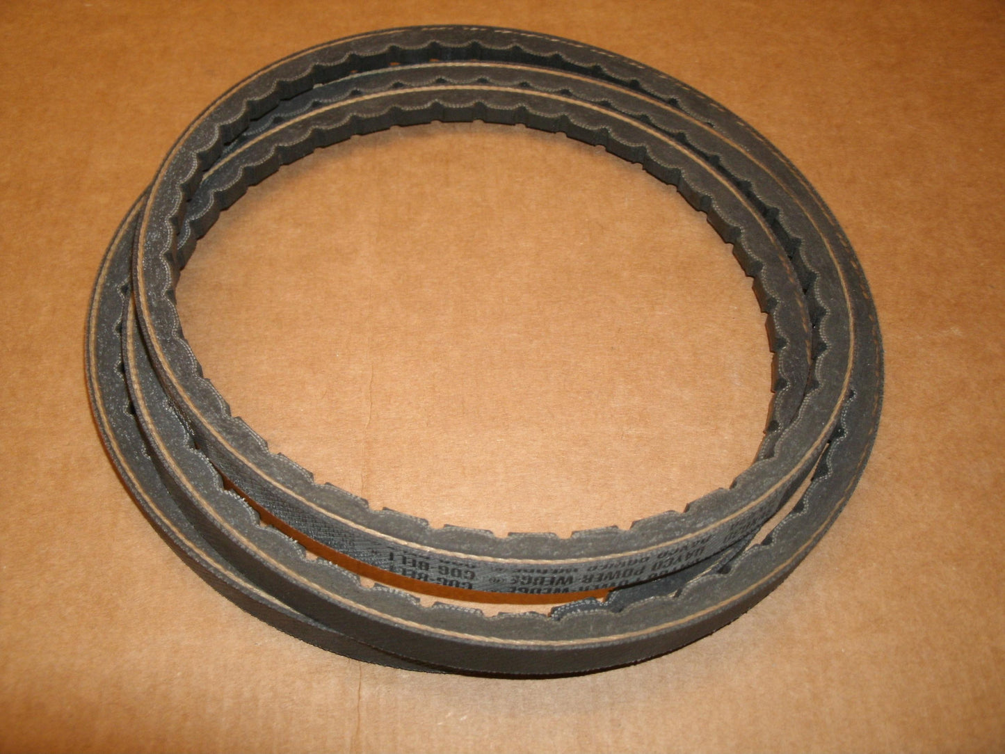 Dayco Power-Wedge 3VX630. Cog Belt. New.