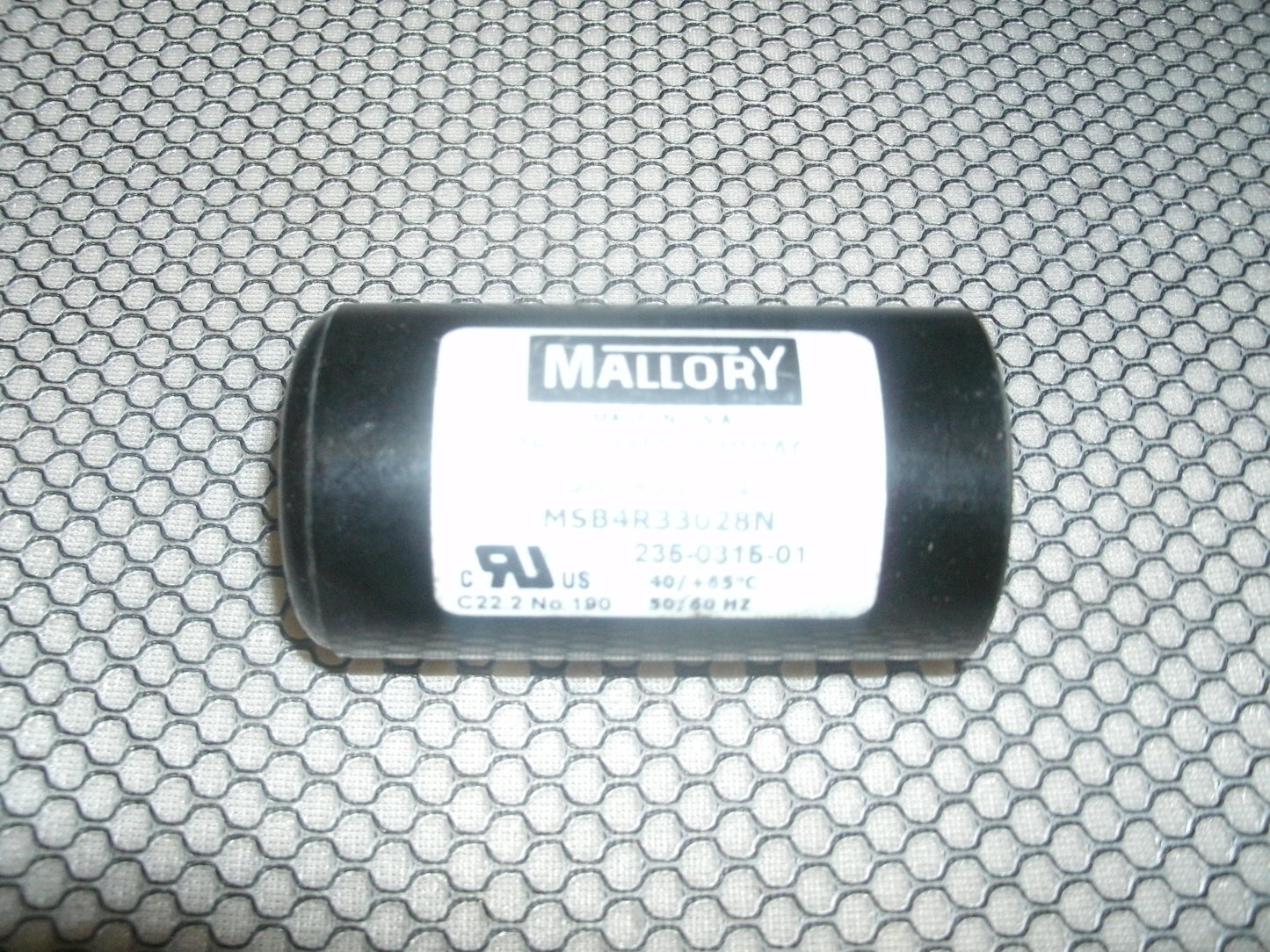 Mallory MSB4R33028N Capacitor 28-33 MFD 330VAC. Used.