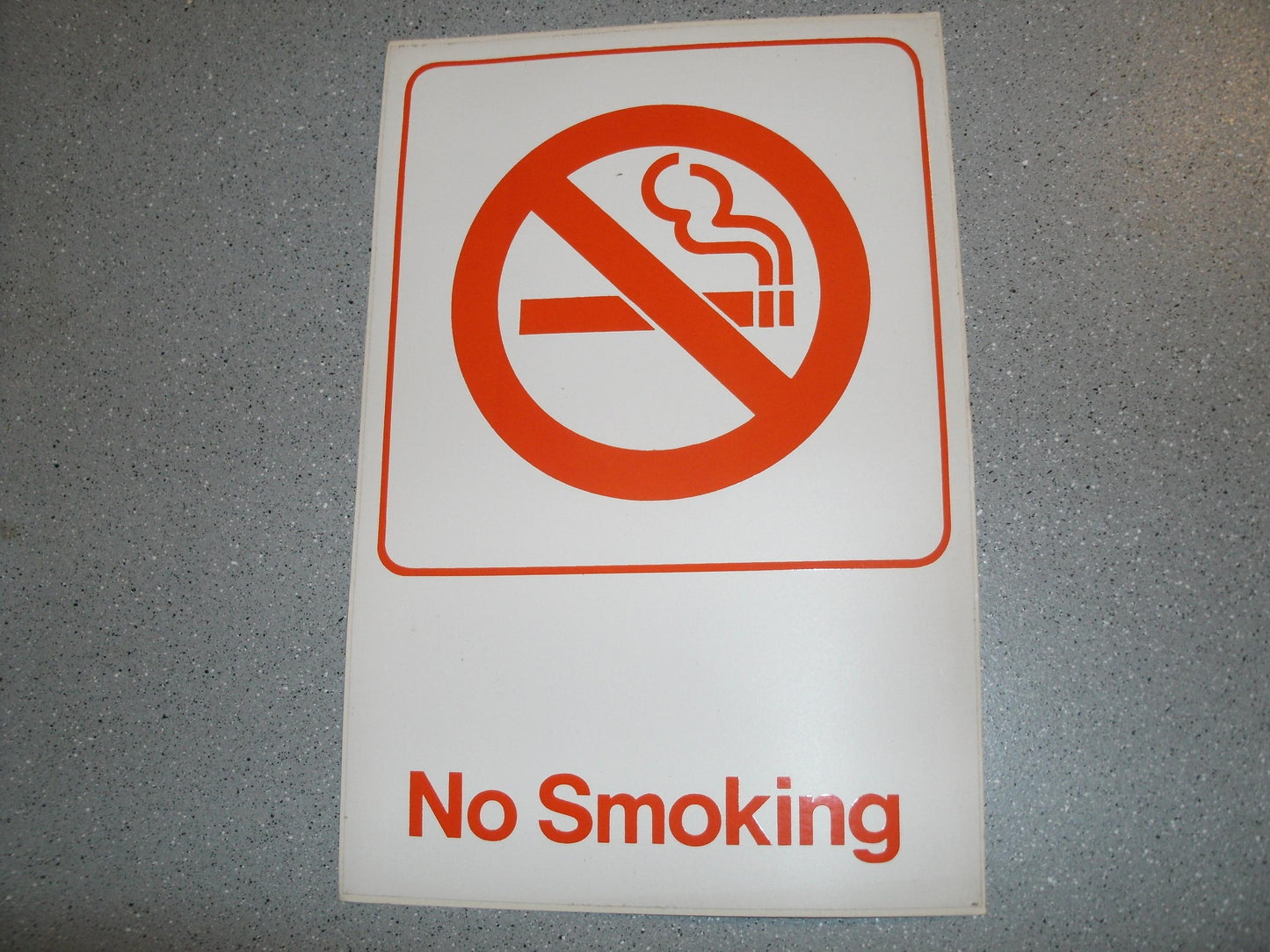 No Smoking Vinyl Self Stick Sign. 6" X 9". White with Red. New.